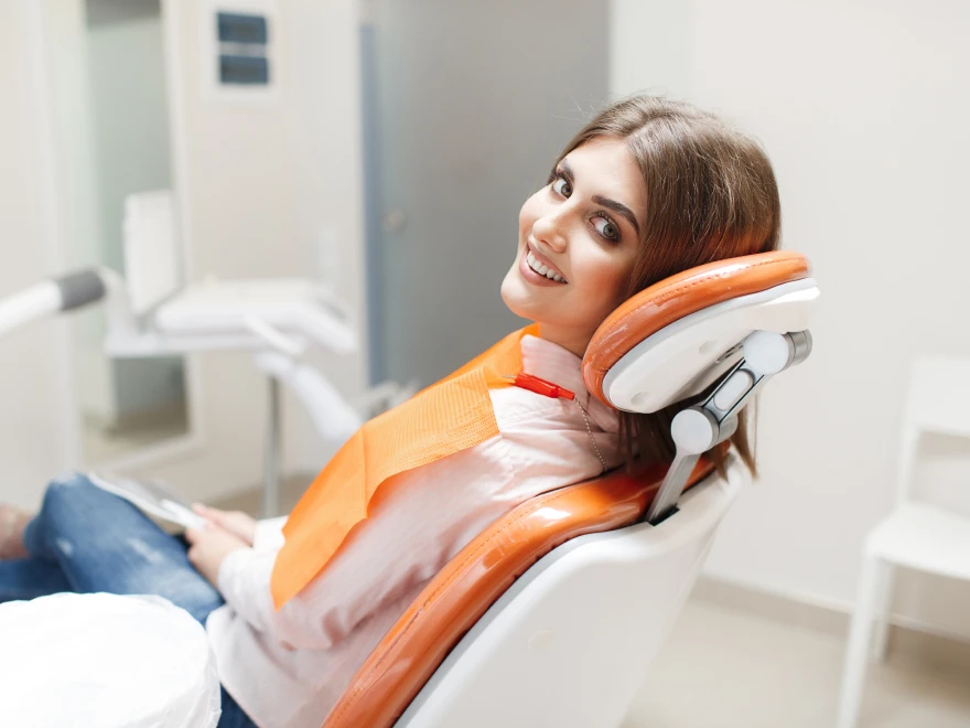 A patient settled comfortably in the dental chair before her appointment